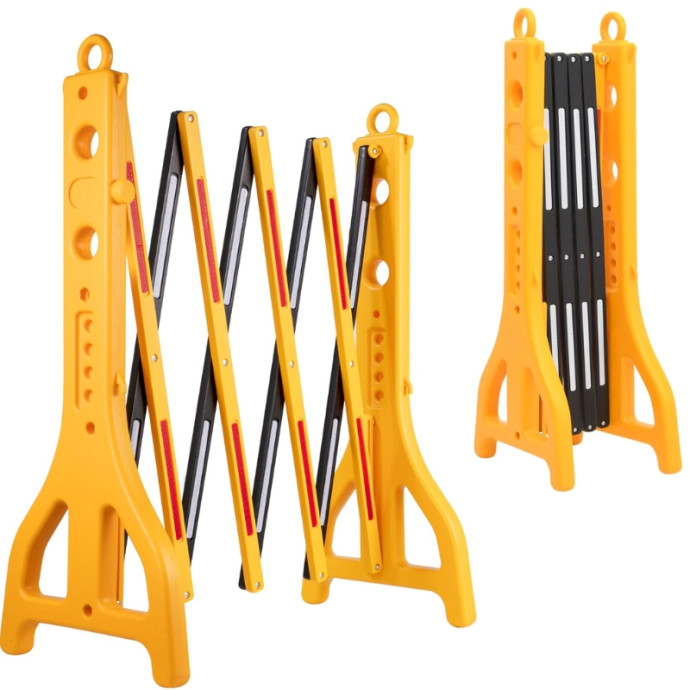 Yellow and black plastic expandable barrier.