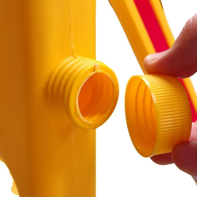 Yellow and black plastic expandable barrier.