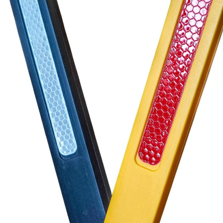 Yellow and black plastic expandable barrier.