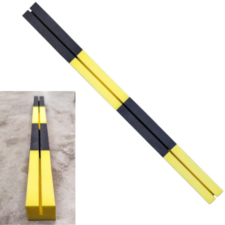 Yellow and black foam cable protector with a 15x3mm slot.