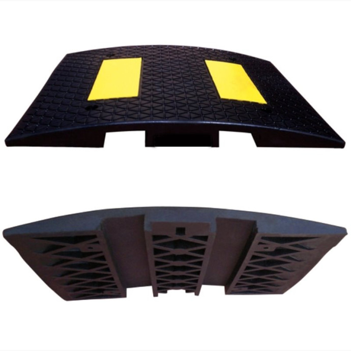 Speed bump and cable protector