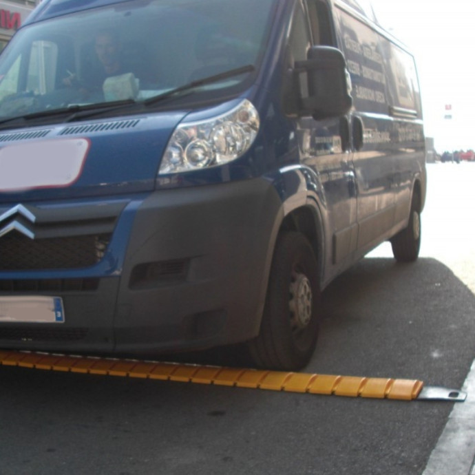 Portable yellow speed bump.
